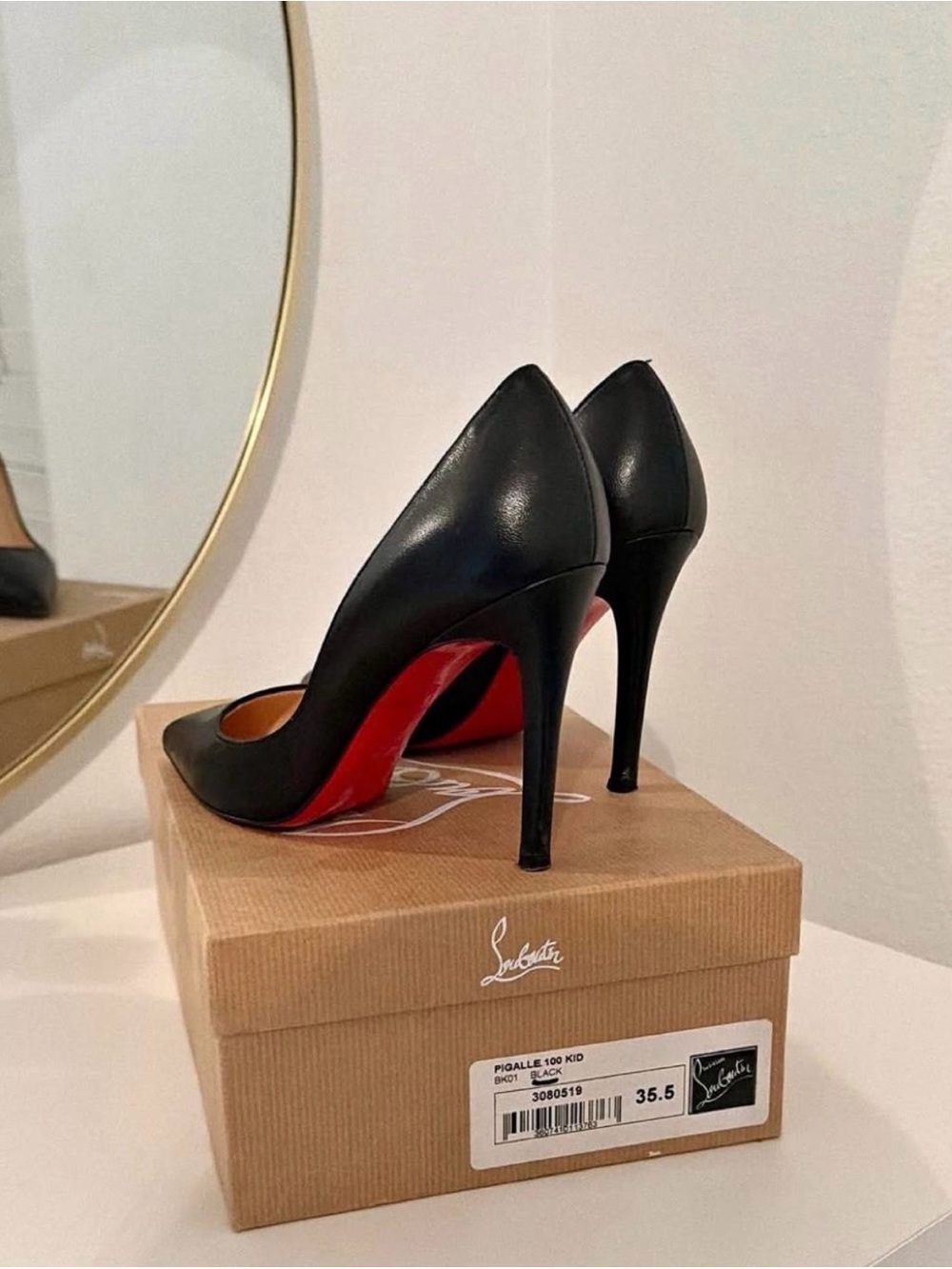 Christian Louboutin Black Leather Pointed Toe Stiletto Heels with Red Soles